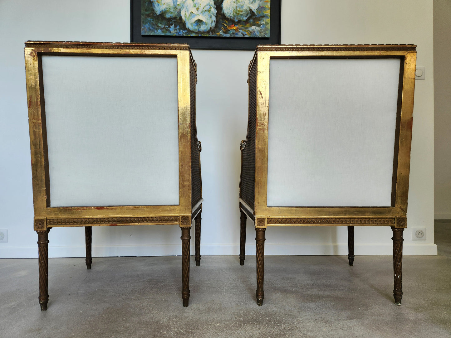 Paire de fauteuils Louis XVI, bois doré, 18ème siècle.