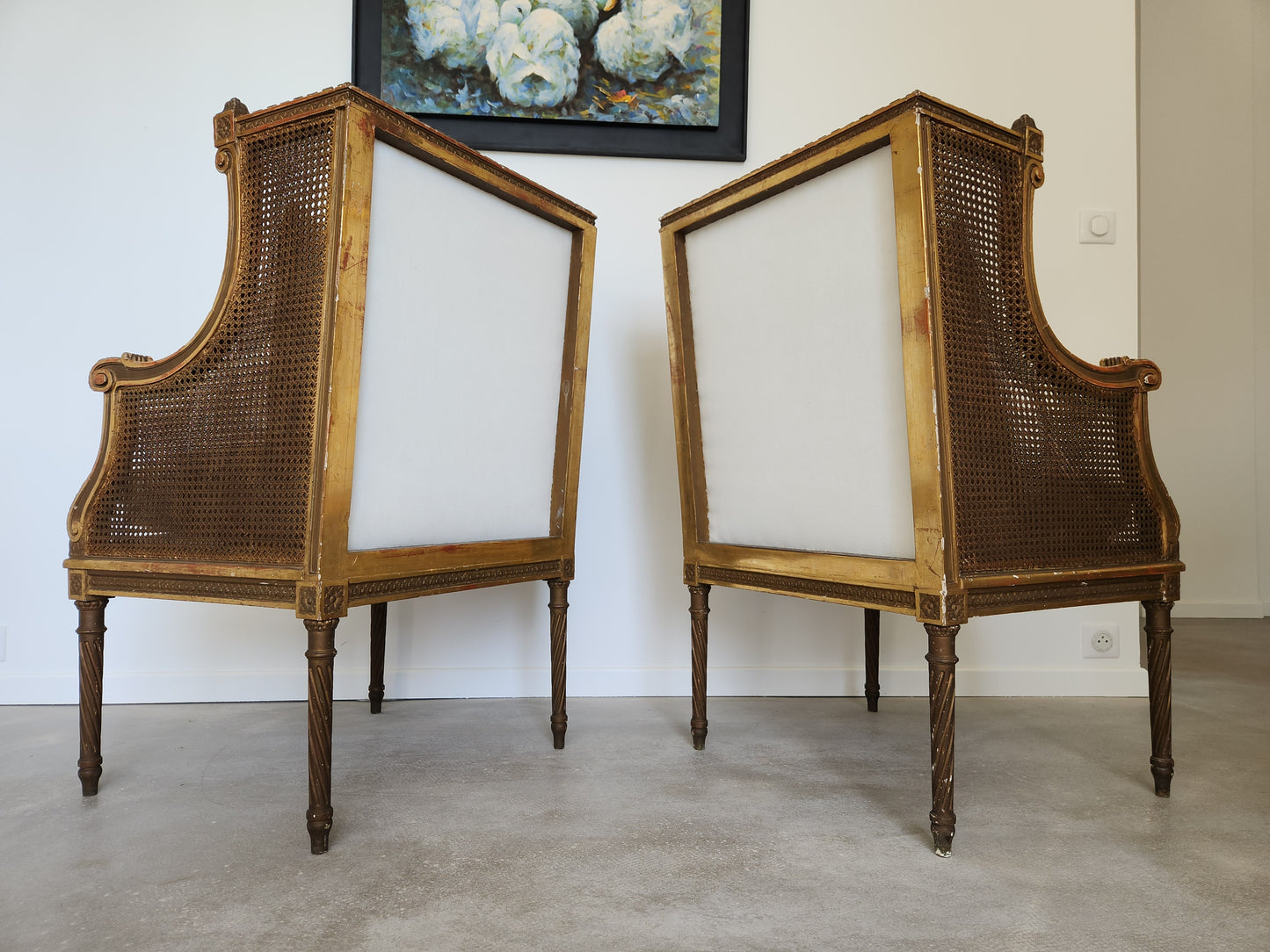 Paire de fauteuils Louis XVI, bois doré, 18ème siècle.